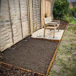 Transformed border complete with new trellis, edging and seating area